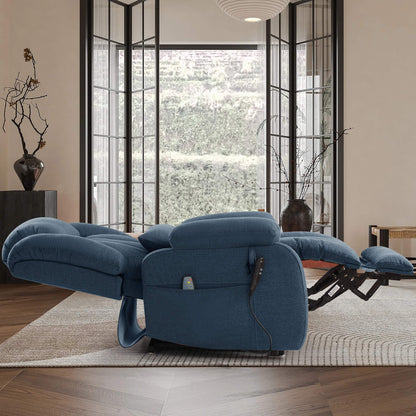 A blue fabric recliner chair with extended footrests and a matching headrest cushion, shown in a fully reclined, flat position in a modern living room.