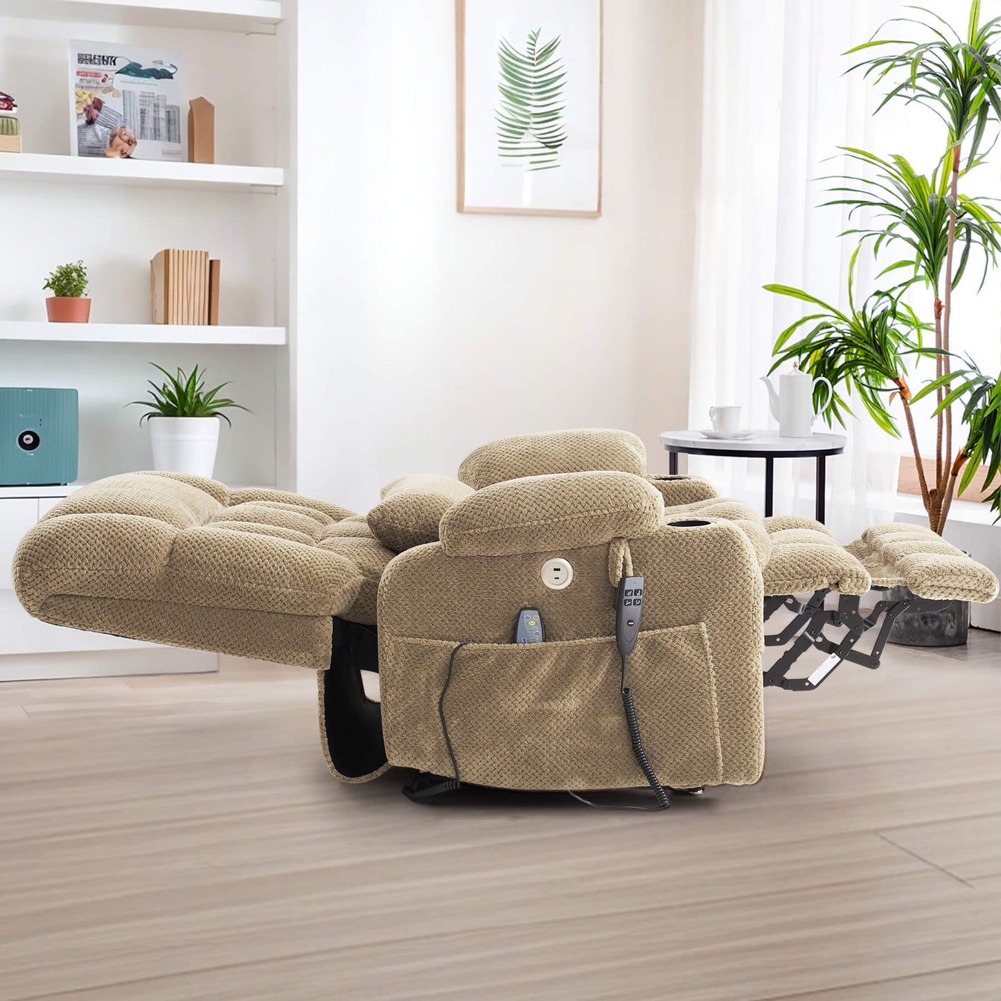 A beige textured lay flat recliner with extended footrest and side pockets, shown fully reclined flat in a living room.