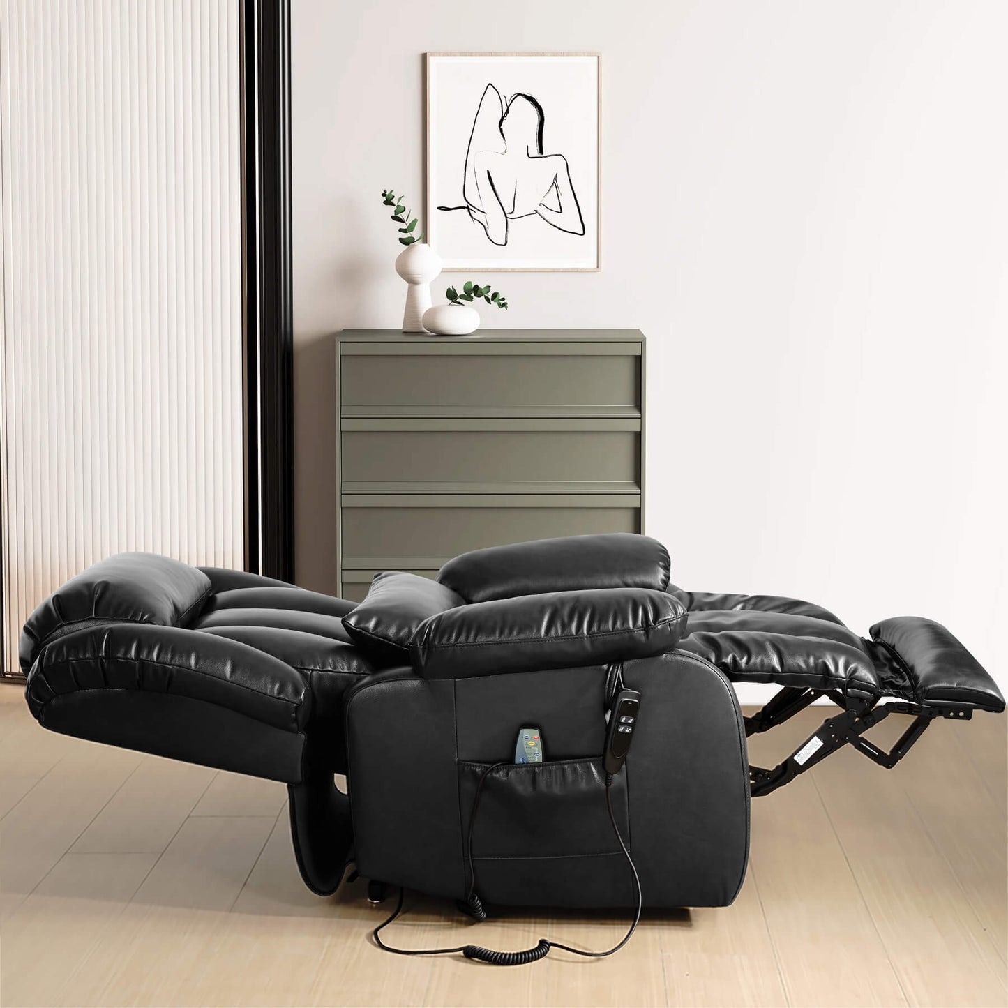 Black leather recliner lies flat in the room.