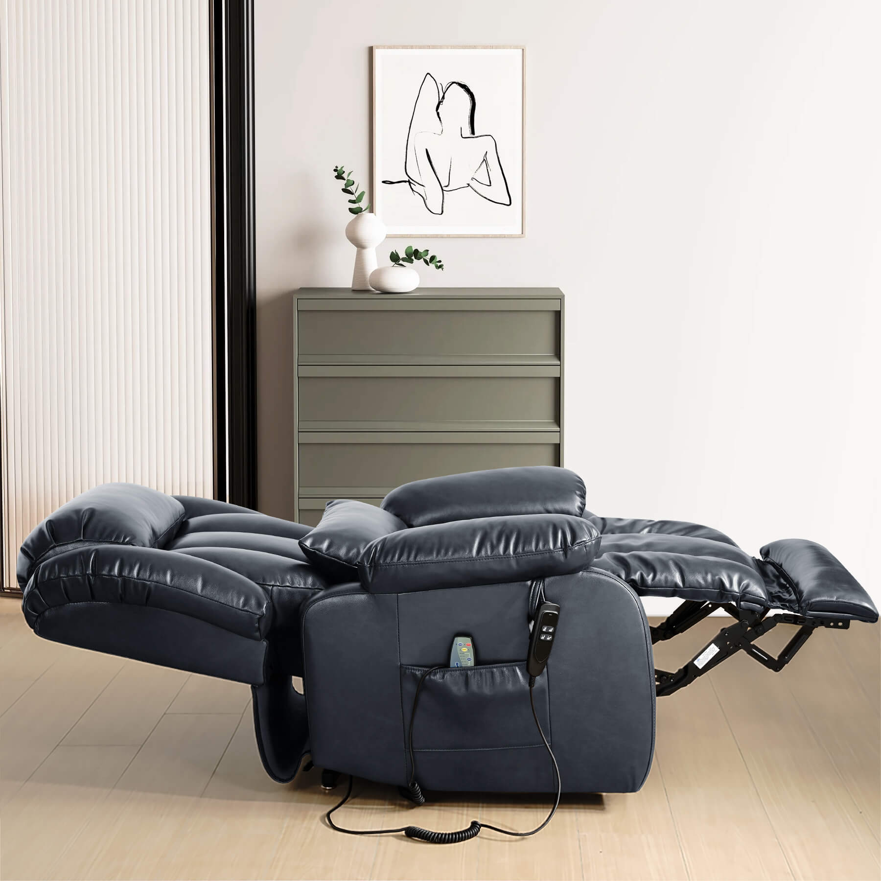 Navy leather recliner lies flat in the room.